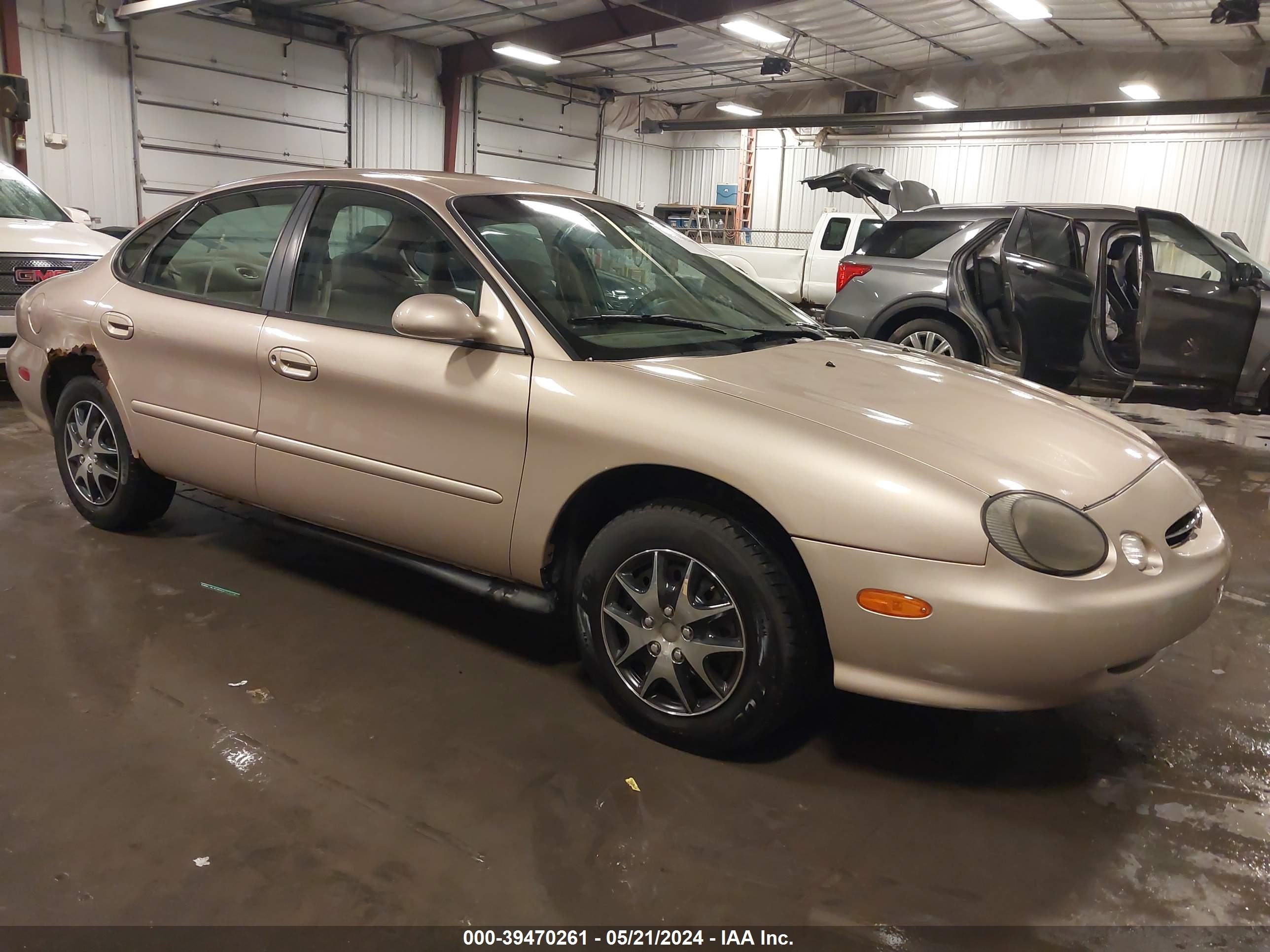 FORD TAURUS 1999 1fafp53u9xg169328