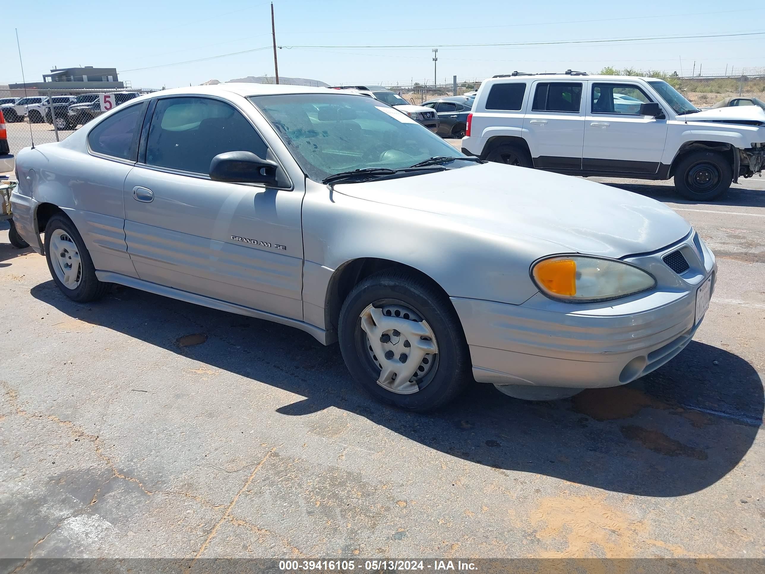 PONTIAC GRAND AM 1999 1g2ne12t7xm935382