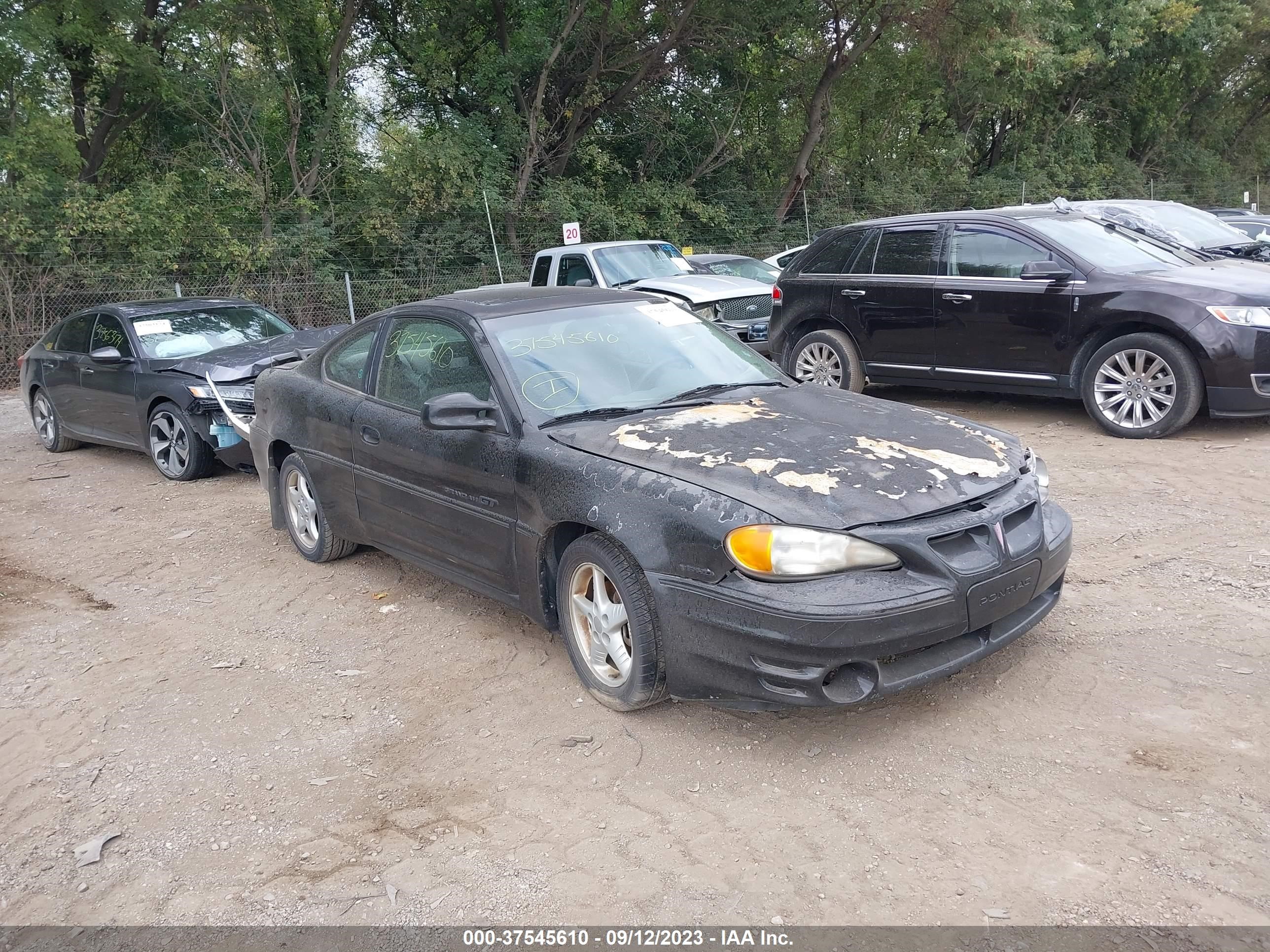 PONTIAC GRAND AM 1999 1g2nw12e5xm940790