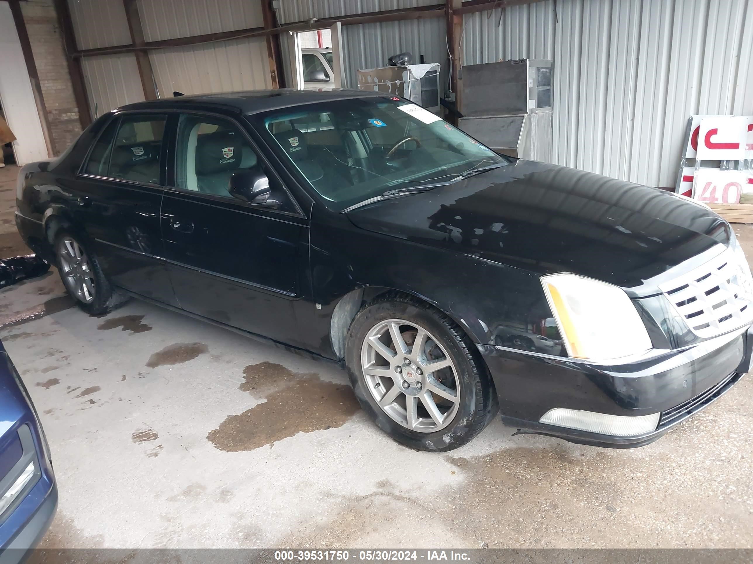 CADILLAC DTS 2009 1g6kd57909u129444