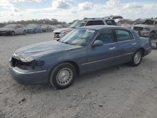 LINCOLN TOWN CAR E 1999 1lnhm81w0xy659504