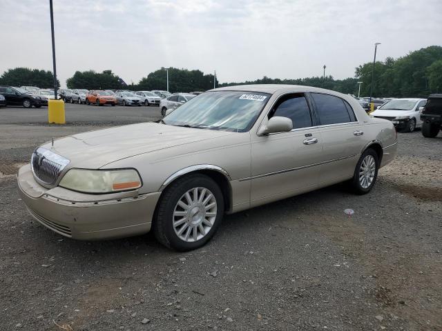 LINCOLN TOWN CAR E 2004 1lnhm81w44y619650