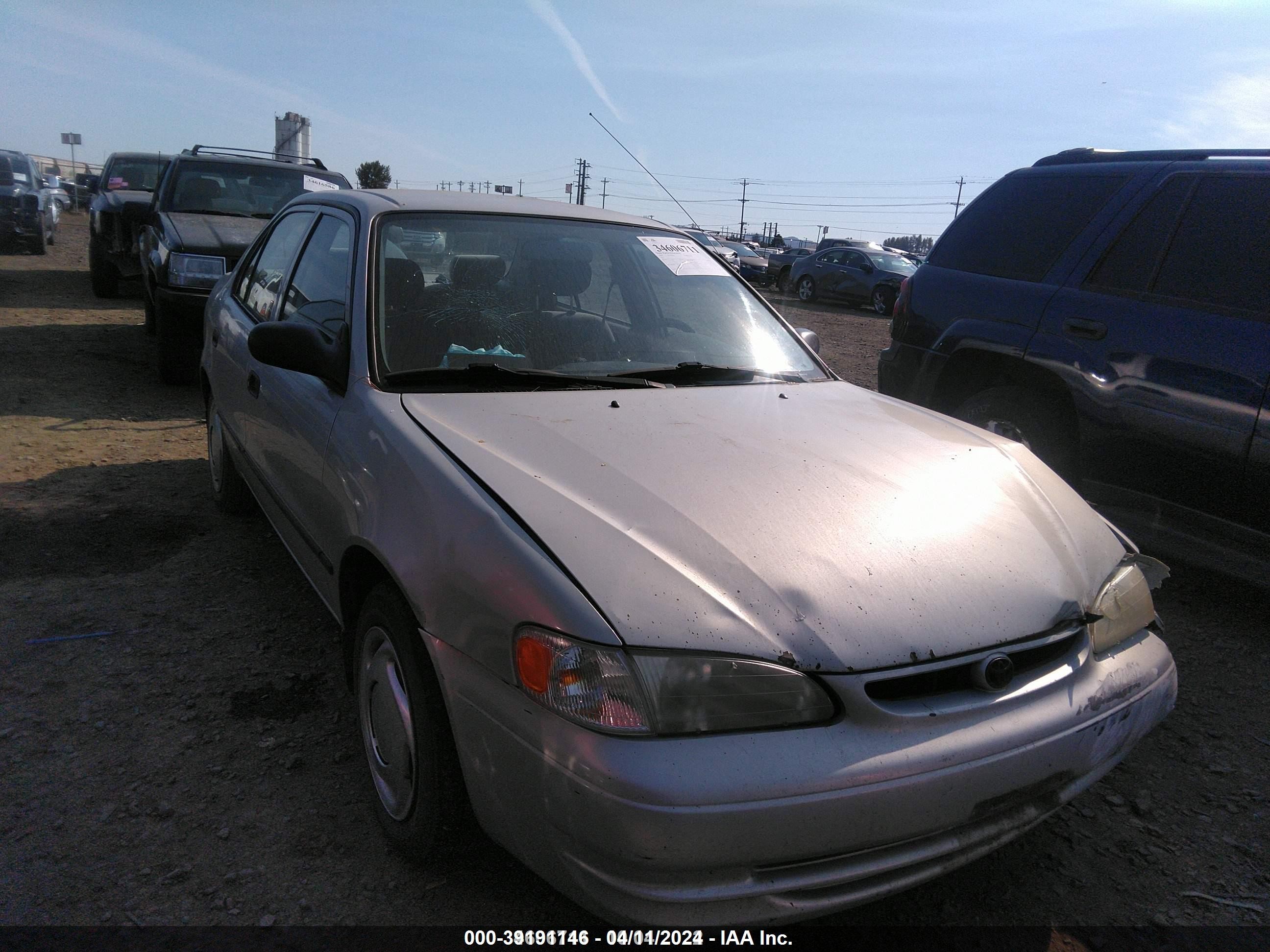 TOYOTA COROLLA 1999 1nxbr12e8xz214083