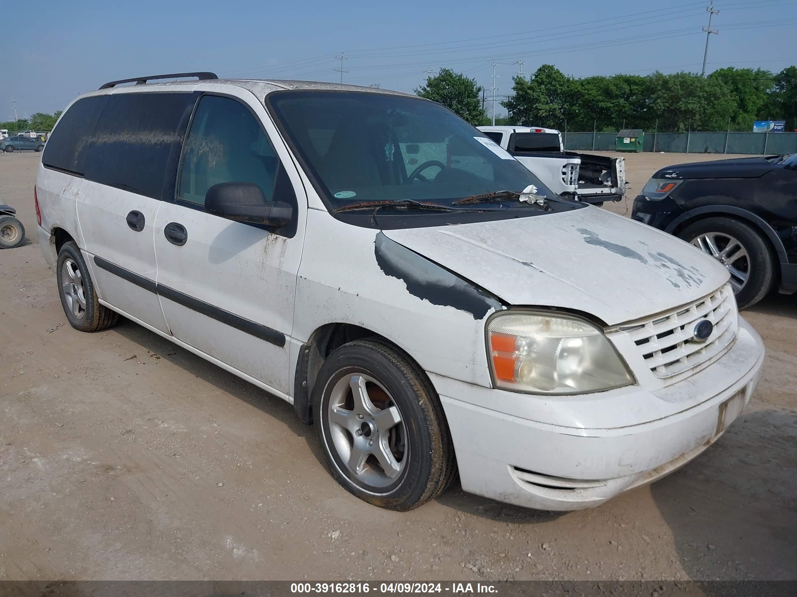 FORD FREESTAR 2004 2fmza51674ba50107