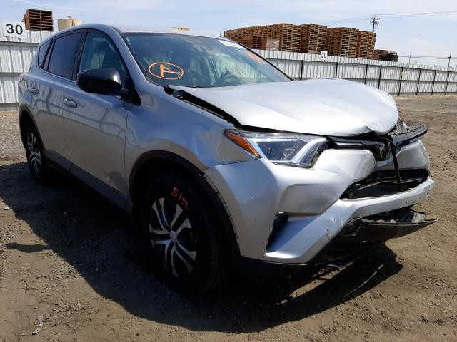 TOYOTA RAV4 LE 2018 2t3zfrev7jw414095