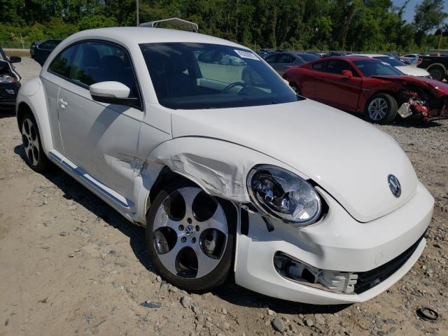 VOLKSWAGEN BEETLE 2014 3vwj17at7em660010