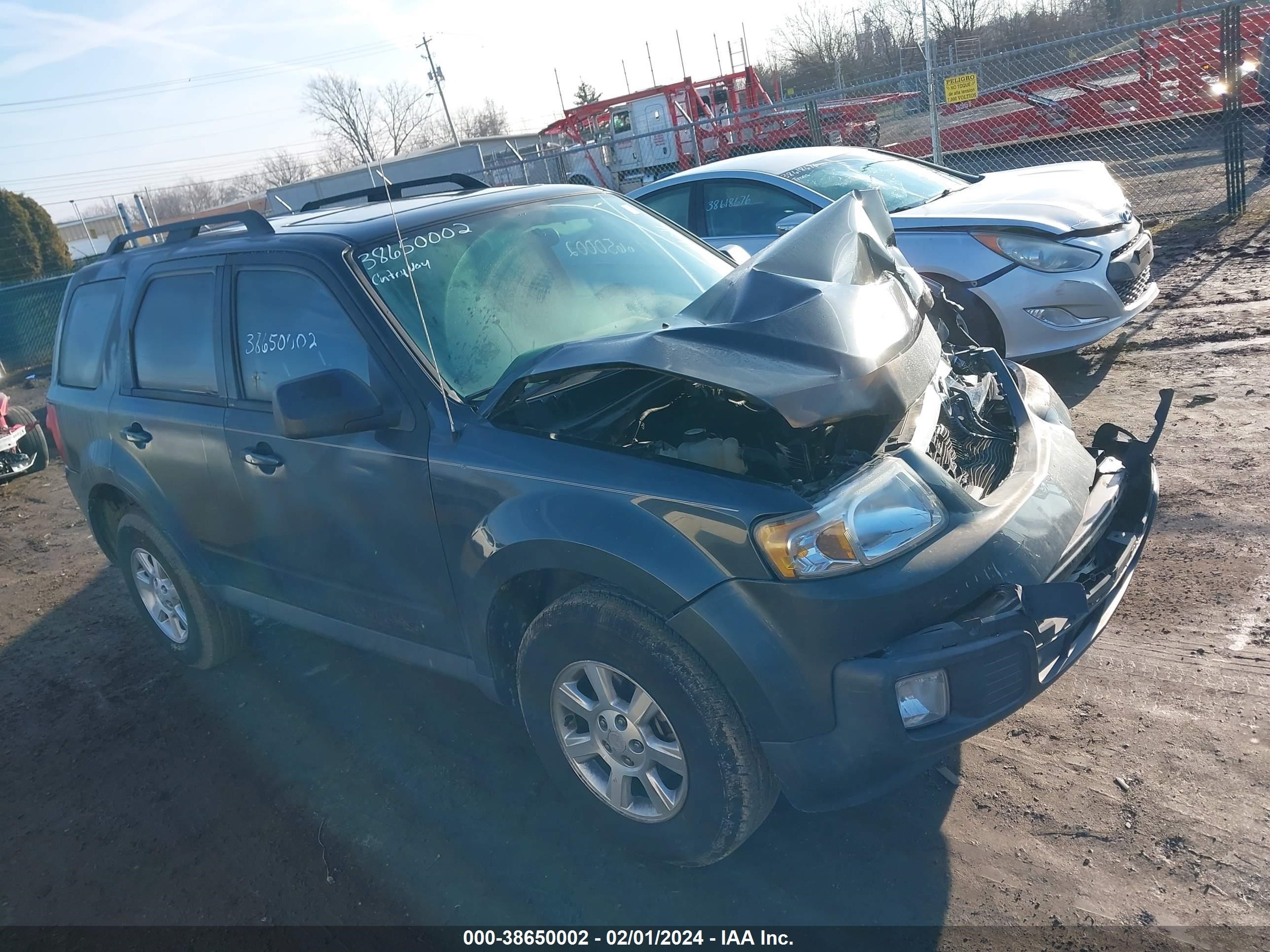 MAZDA TRIBUTE 2009 4f2cz02749km08404