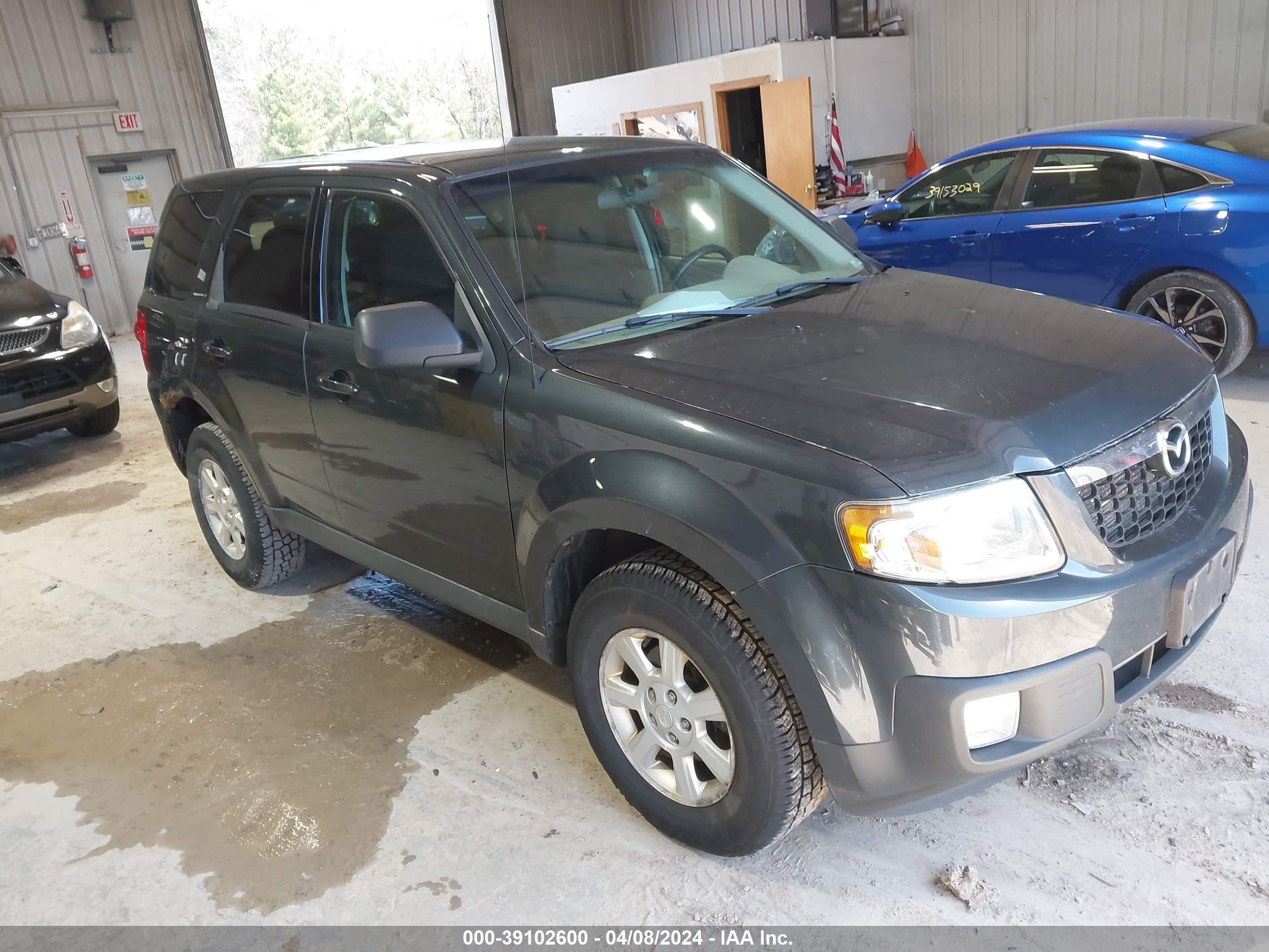 MAZDA TRIBUTE 2009 4f2cz02779km04248