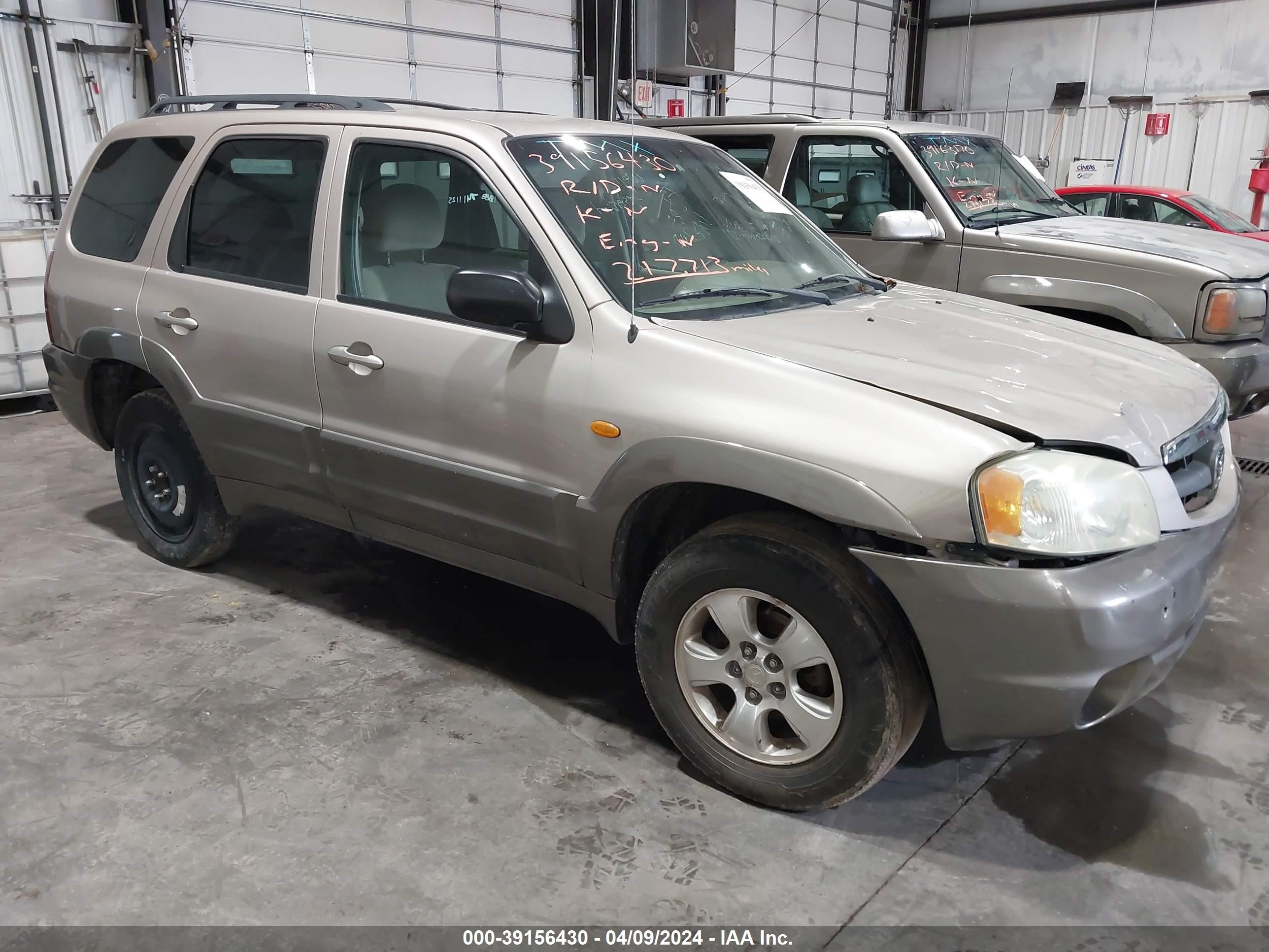 MAZDA TRIBUTE 2002 4f2yu091x2km24120