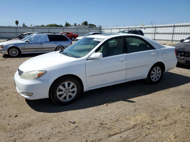 TOYOTA CAMRY LE 2004 4t1bf32k34u072795