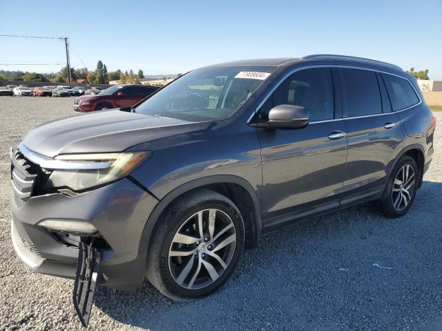 HONDA PILOT TOUR 2016 5fnyf5h90gb034470