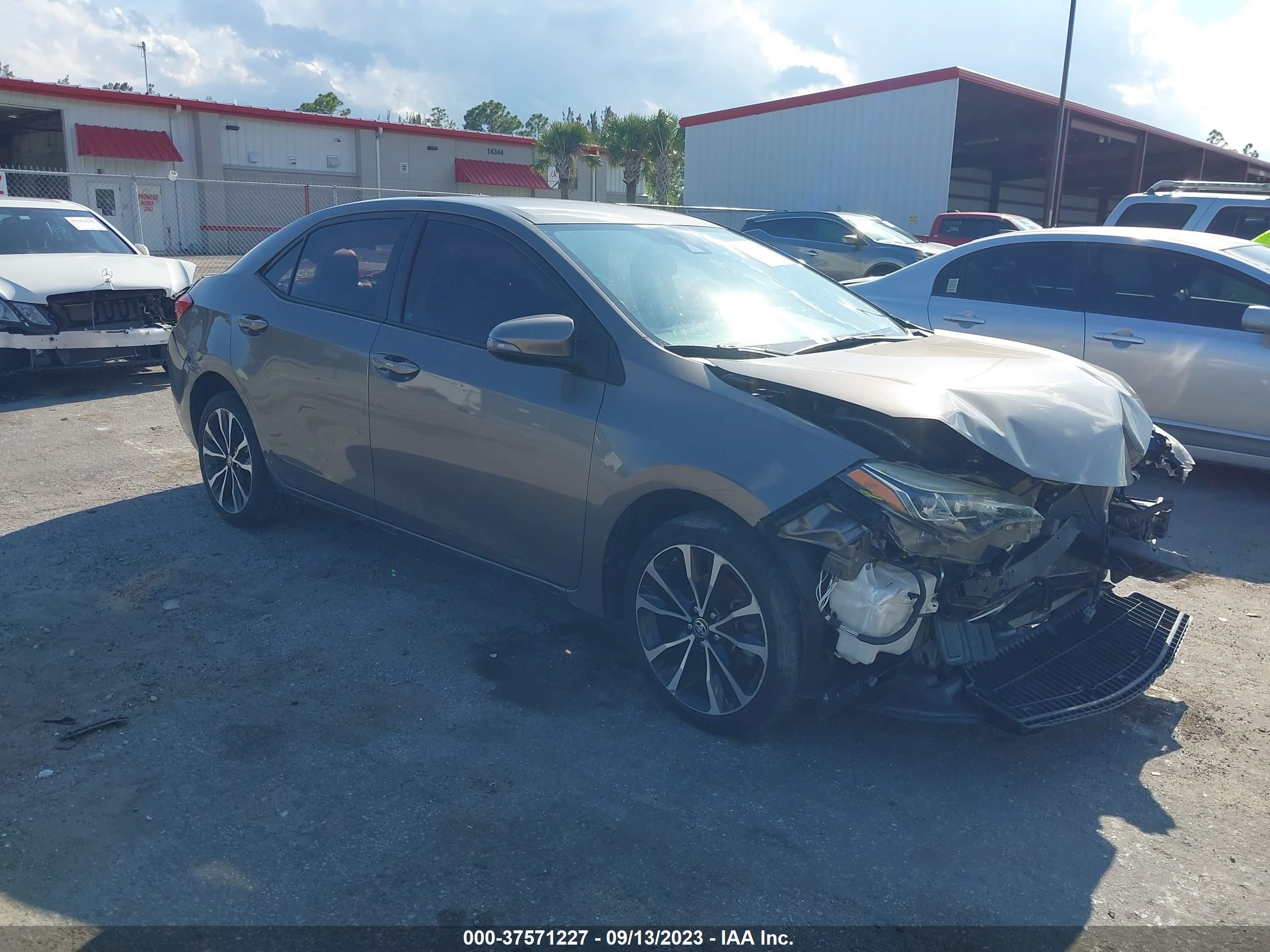 TOYOTA COROLLA 2017 5yfburhe6hp678545