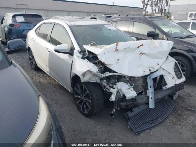 TOYOTA COROLLA 2017 5yfburhe7hp667456