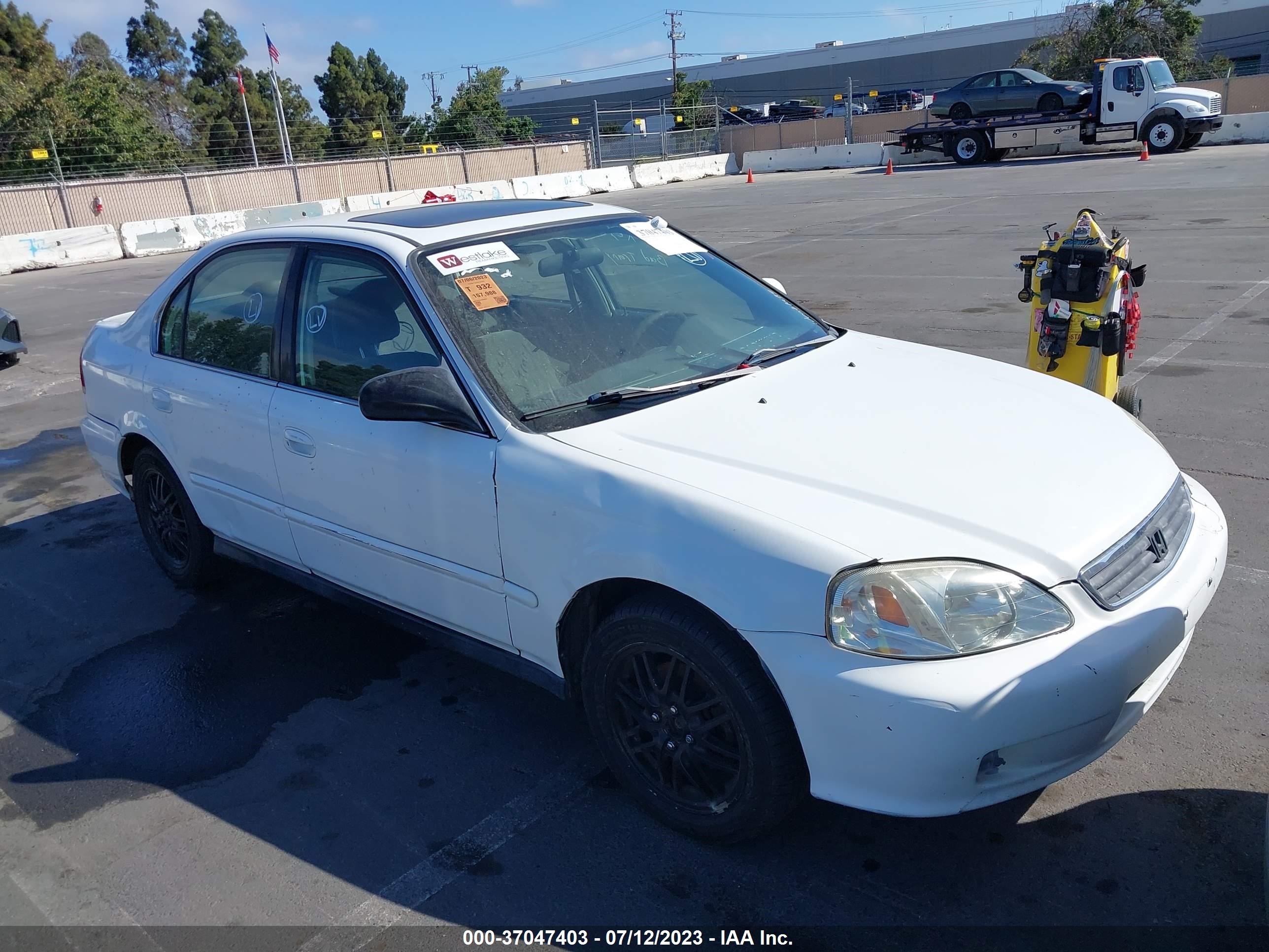 HONDA CIVIC 1999 jhmej8645xs000052