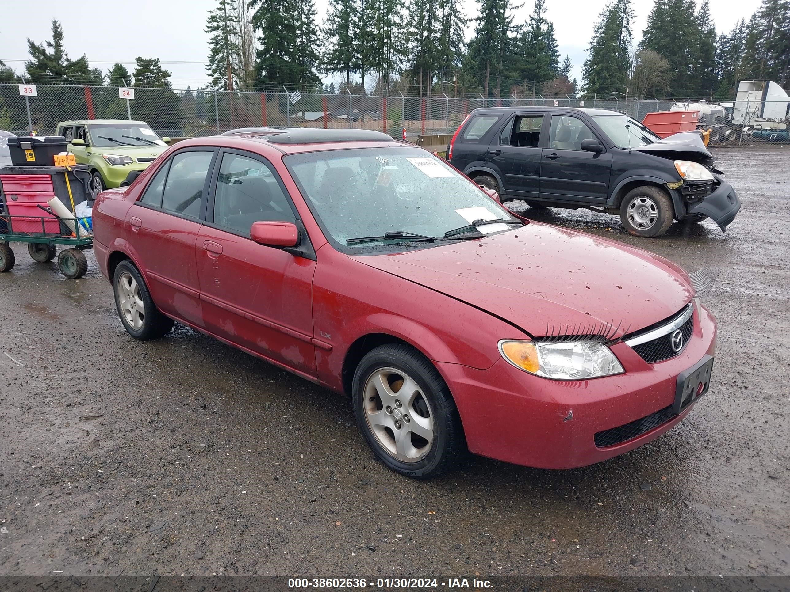 MAZDA PROTEGE 2002 jm1bj225720521083