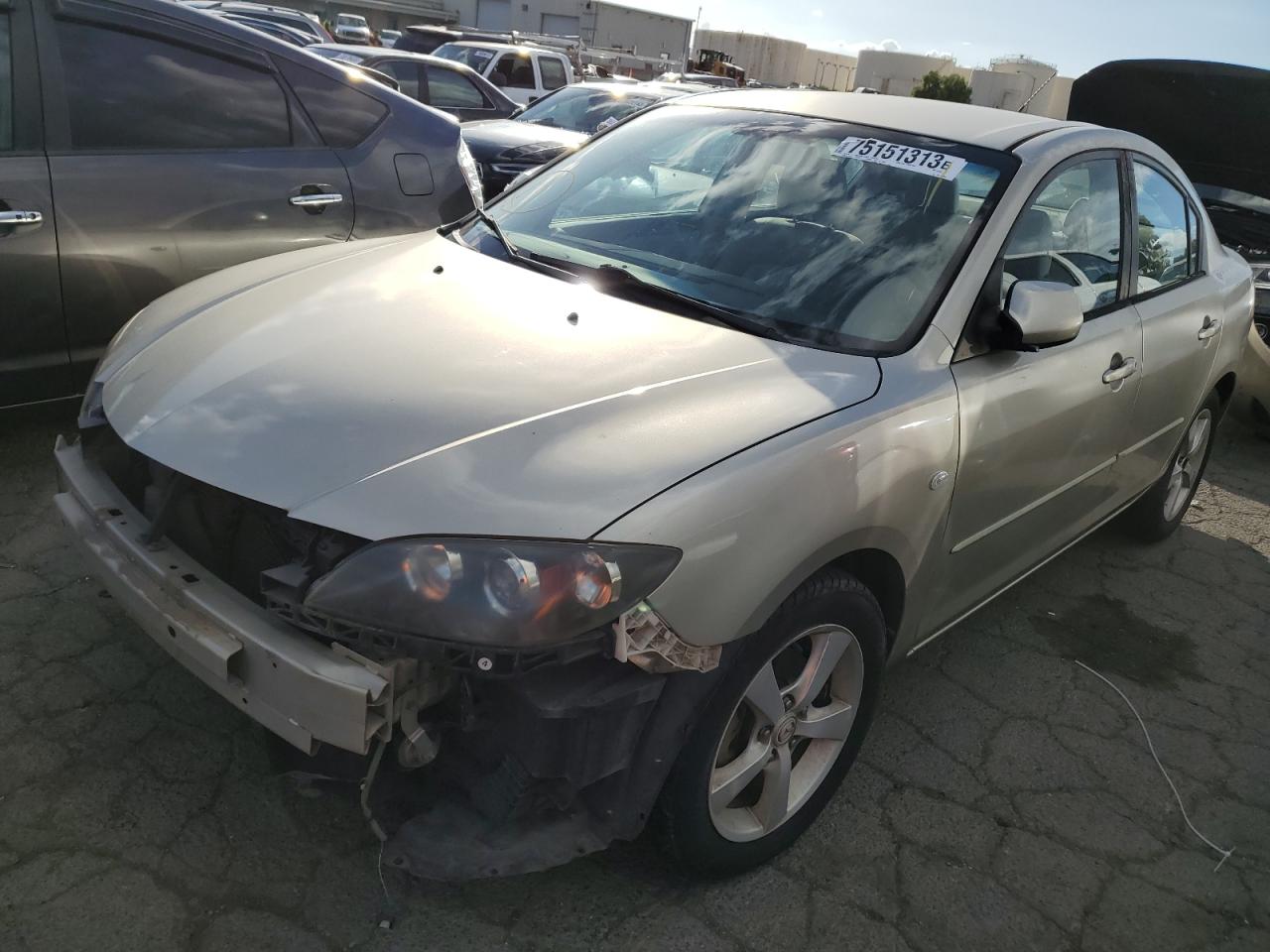 MAZDA 3 2005 jm1bk12fx51274933