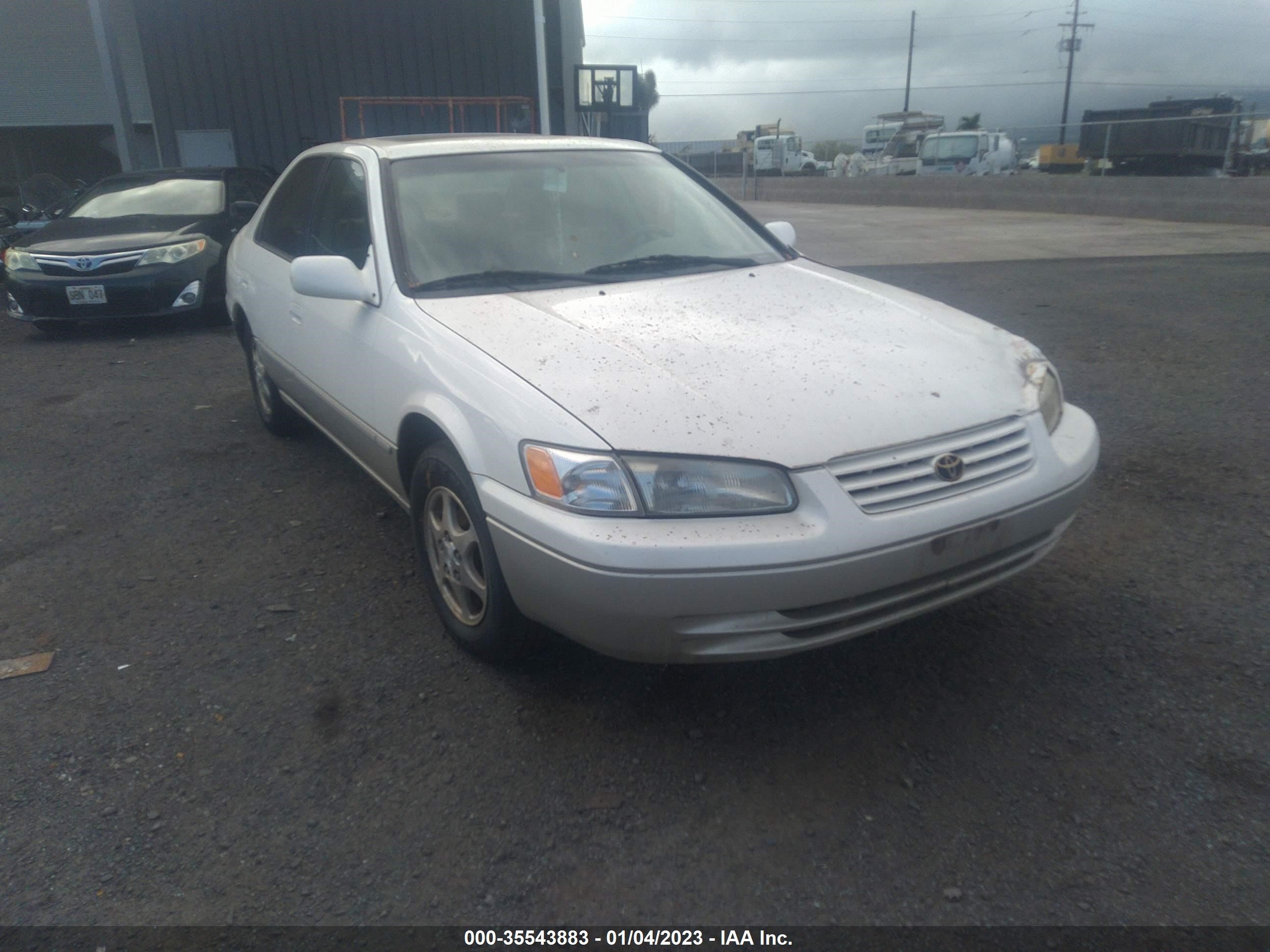 TOYOTA CAMRY 1999 jt2bg22k5x0371219