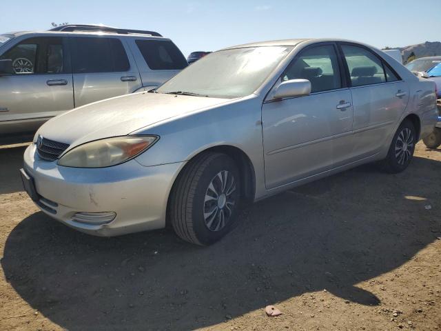 TOYOTA CAMRY LE 2002 jtdbe32k220101599