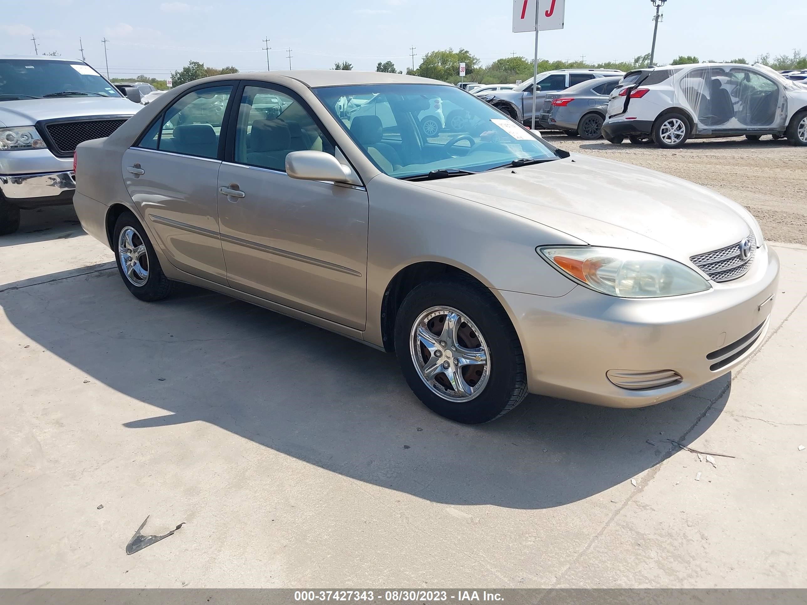 TOYOTA CAMRY 2002 jtdbe32k520001772