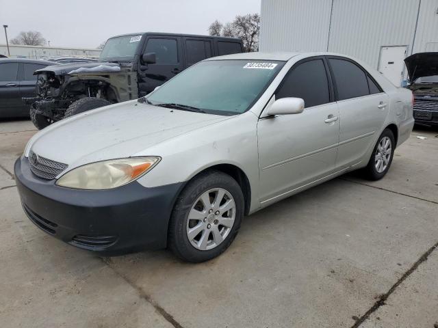 TOYOTA CAMRY 2002 jtdbe32k520012125