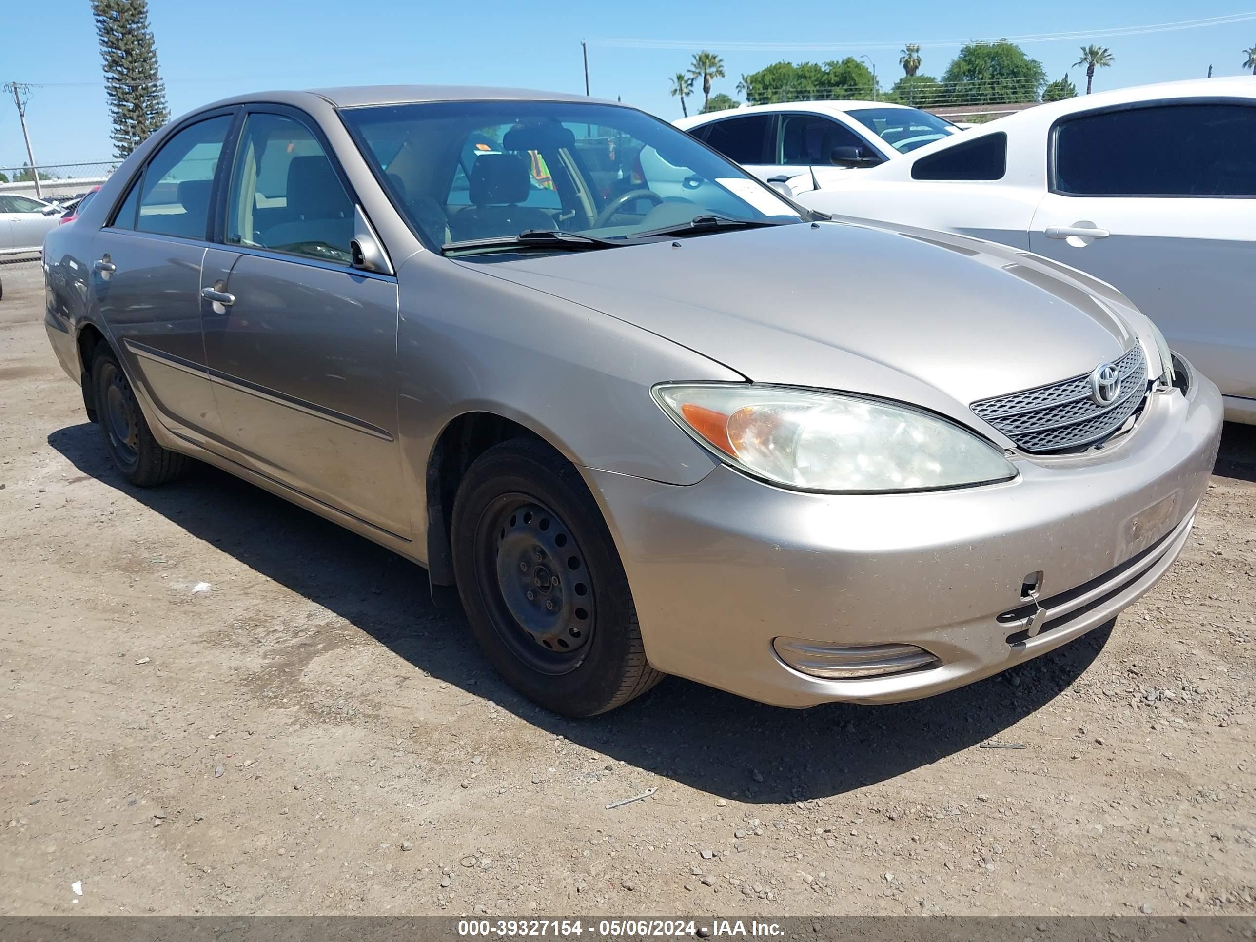 TOYOTA CAMRY 2002 jtdbe32k520036361