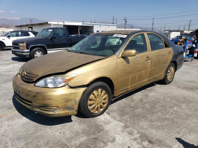 TOYOTA CAMRY LE 2002 jtdbe32k520057422