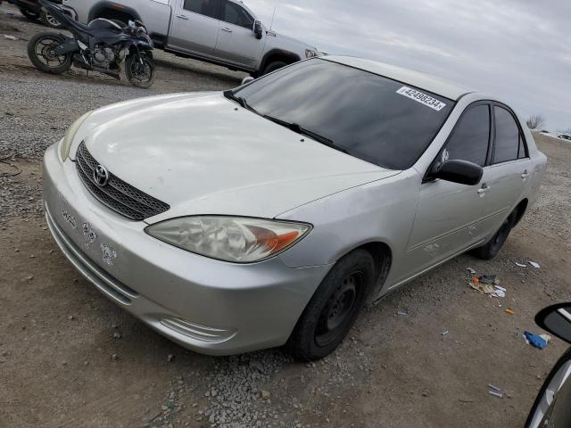 TOYOTA CAMRY 2002 jtdbe32k720007329