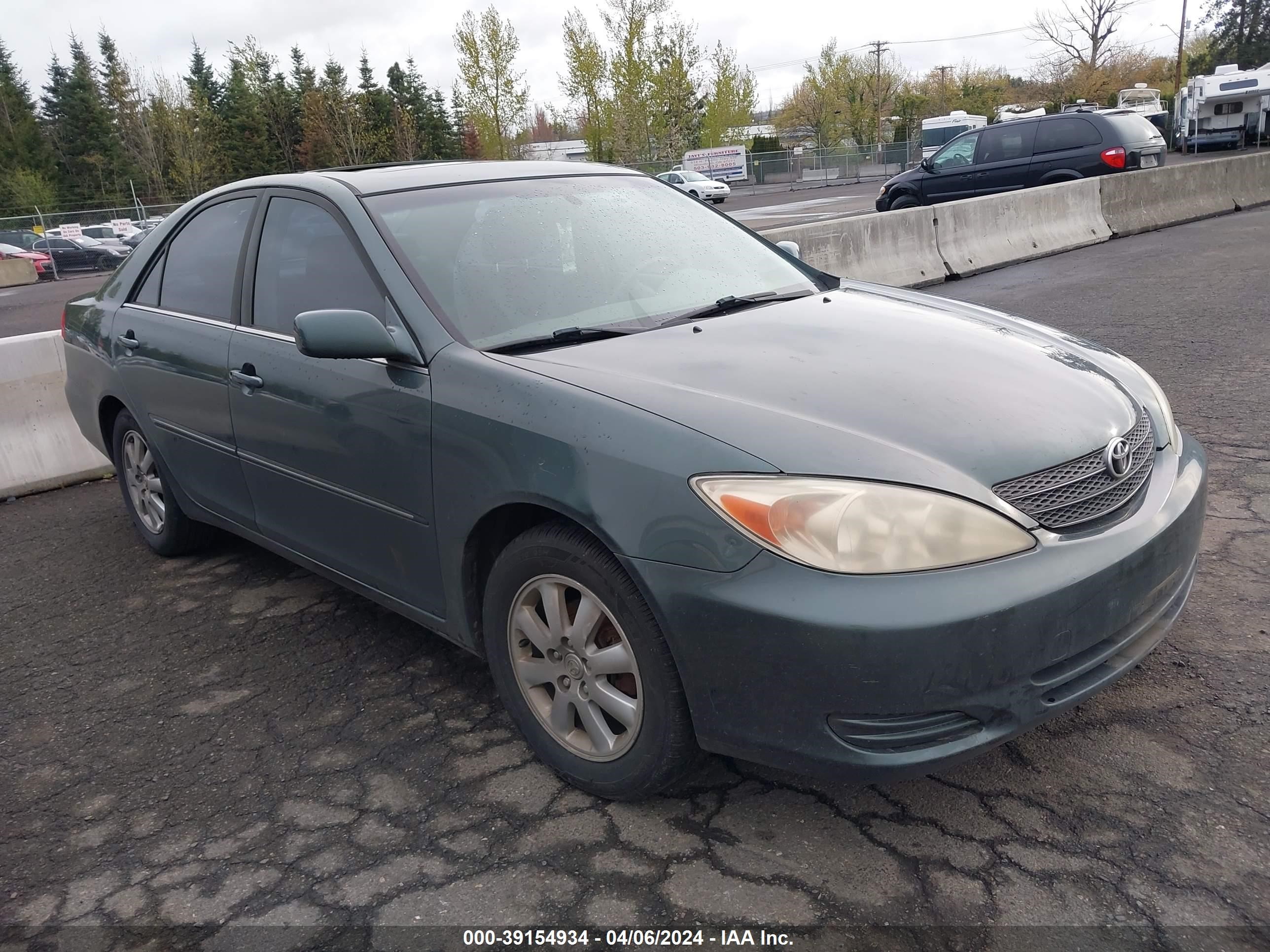 TOYOTA CAMRY 2002 jtdbf30k720008433