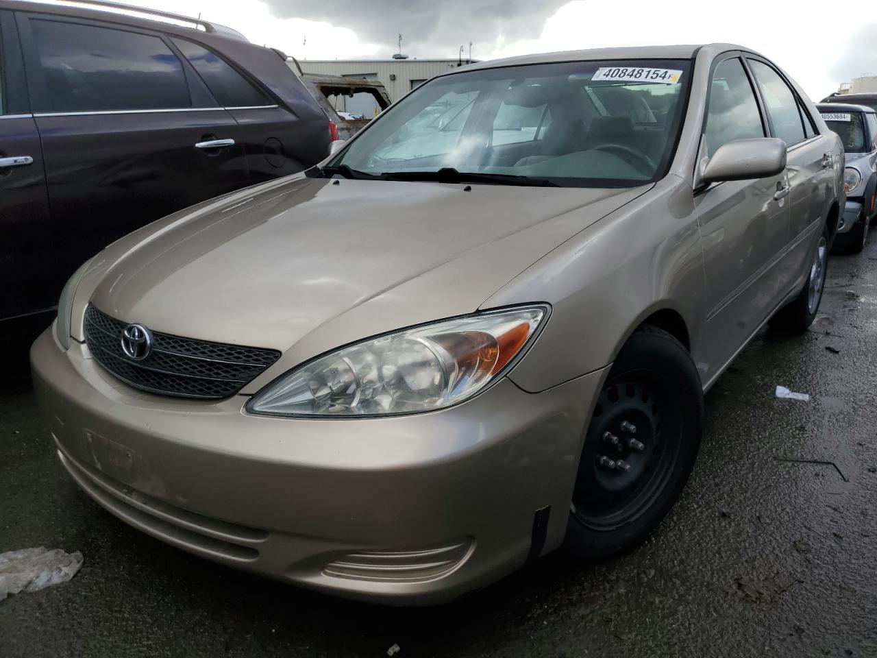 TOYOTA CAMRY 2002 jtdbf30k920070691