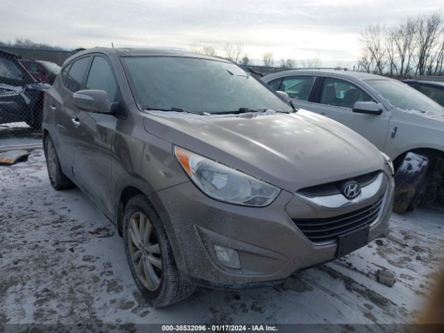 HYUNDAI TUCSON 2011 km8jucac8bu171041