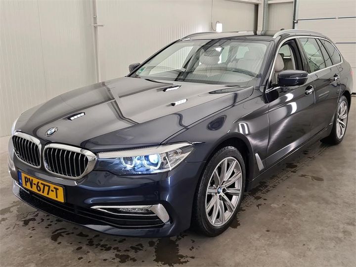 BMW 5 2017 wbajm71080b068211