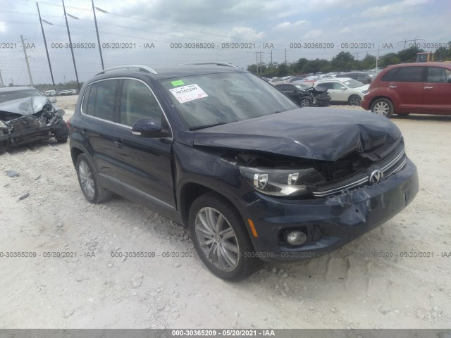 VOLKSWAGEN TIGUAN 2014 wvgav7ax8fw566094